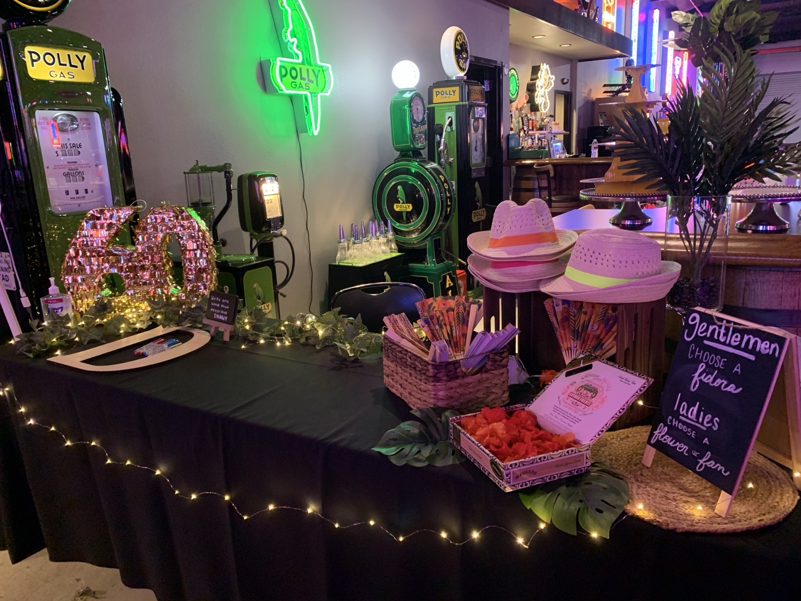 40th birthday celebration with lit marquee numbers and neon signs at Highway 39 Event Center