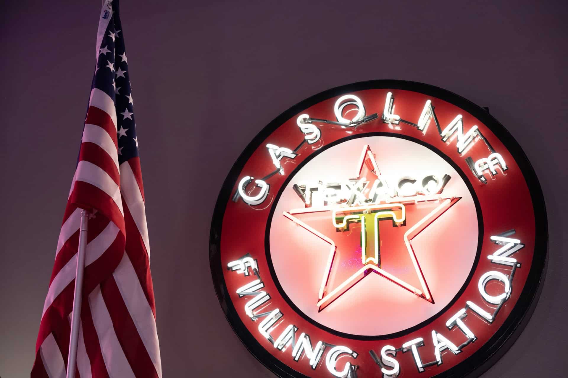 Highway 39 Event Center neon sign with Texas flag.